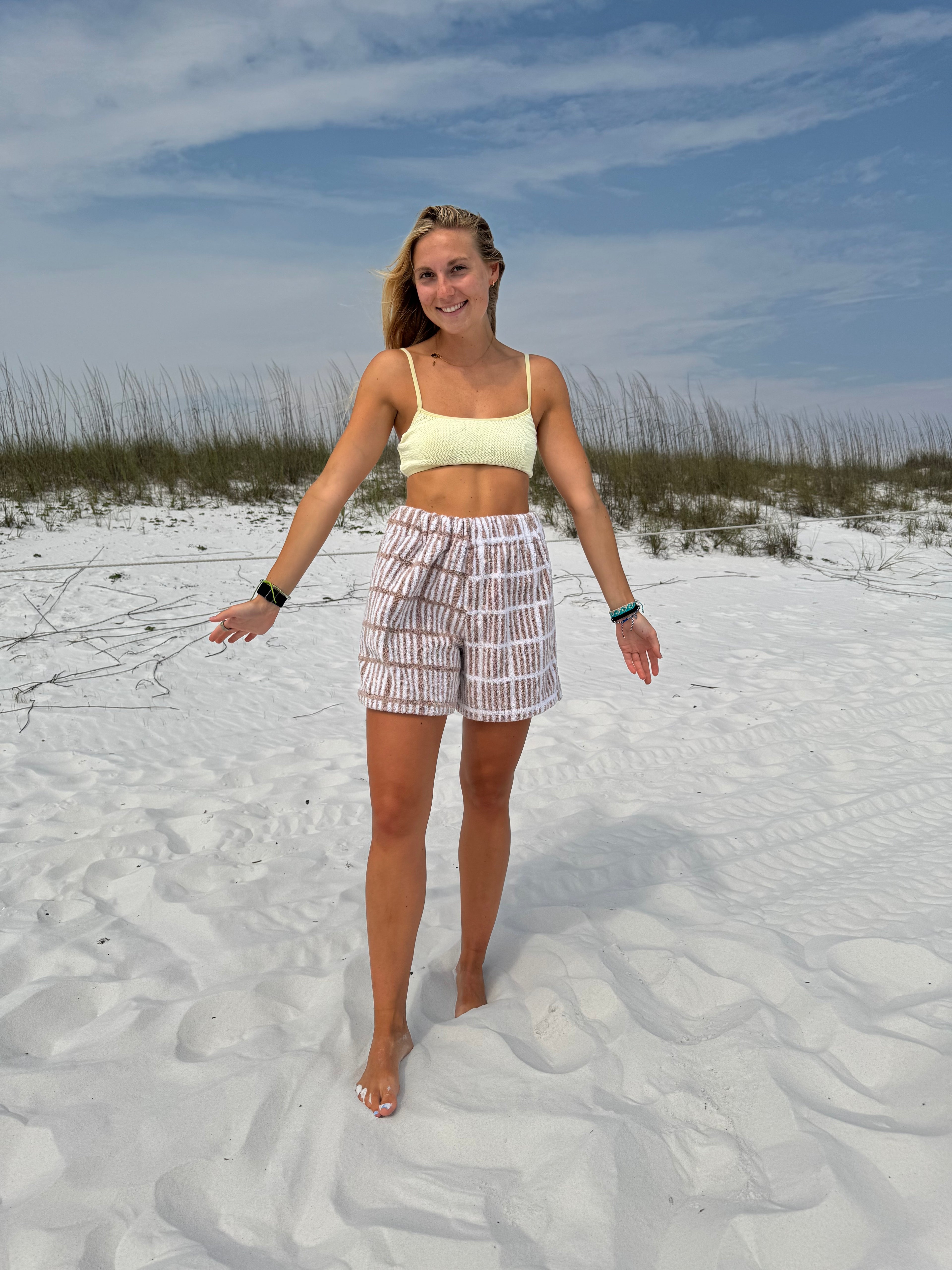 tan and white shorts - M