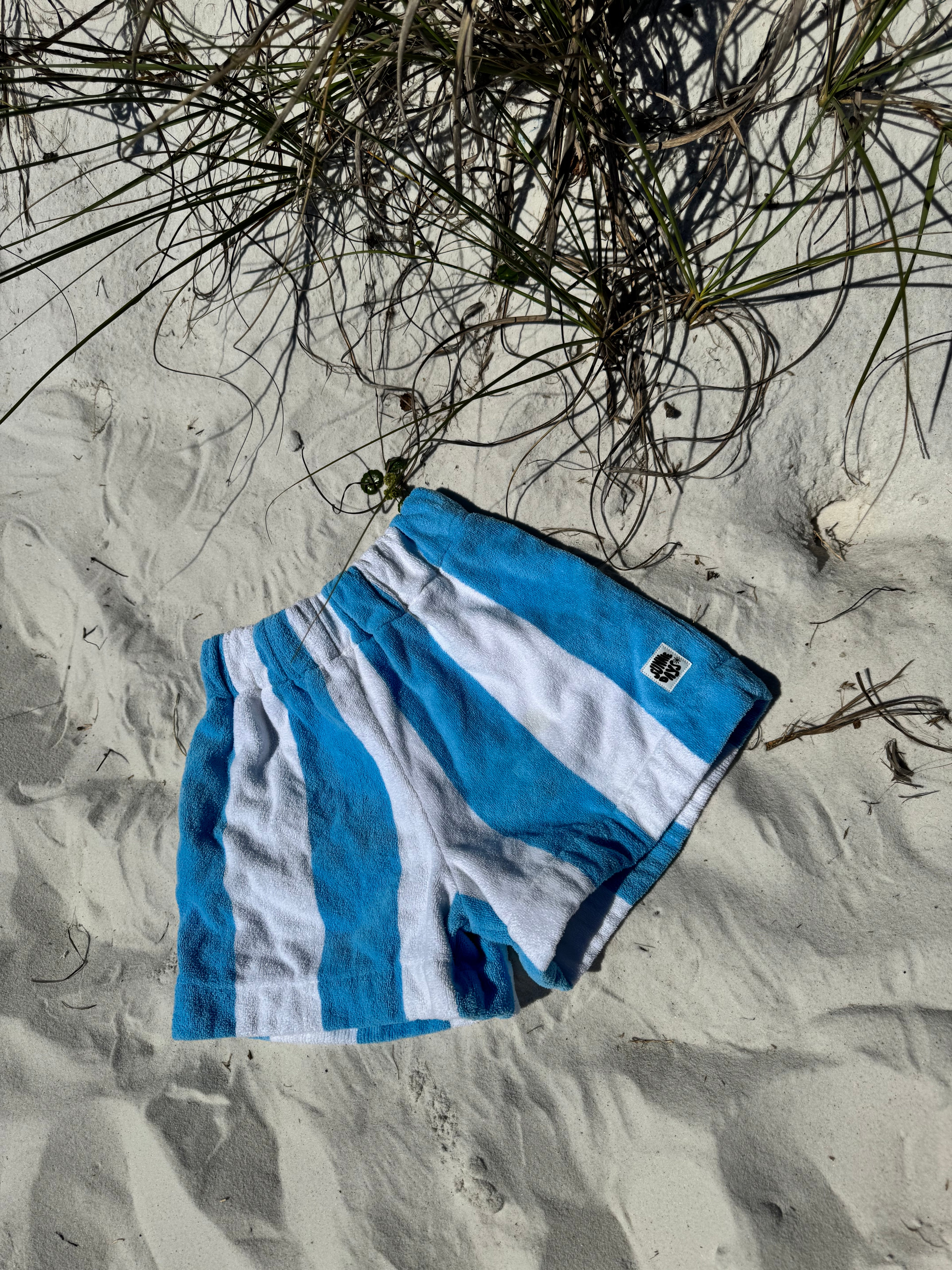 Light blue striped shorts (long)